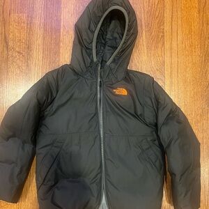 The North Face Black Jacket with Orange Logo
